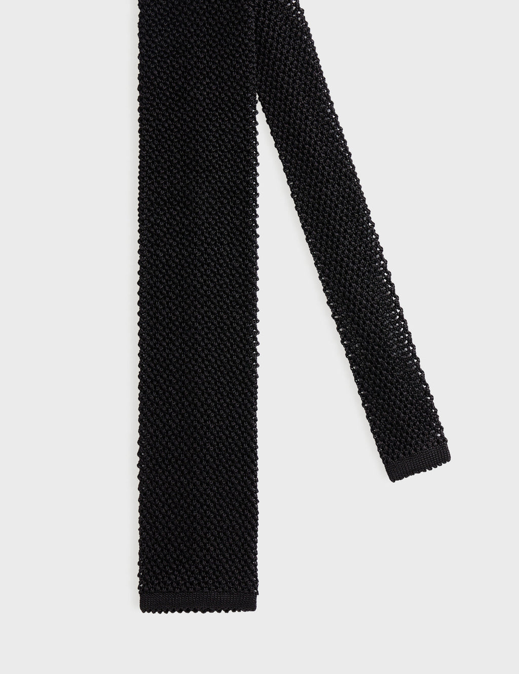Cravate en maille de soie noire